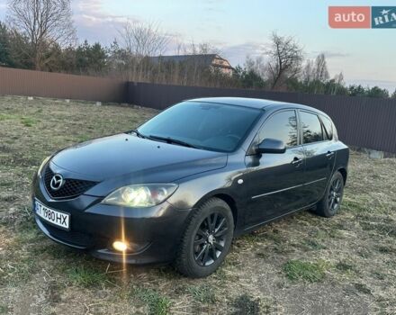 Серый Мазда 3, объемом двигателя 1.56 л и пробегом 250 тыс. км за 3899 $, фото 1 на Automoto.ua