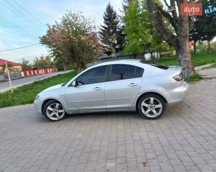 Серый Мазда 3, объемом двигателя 1.6 л и пробегом 396 тыс. км за 4400 $, фото 1 на Automoto.ua