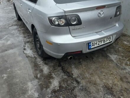 Серый Мазда 3, объемом двигателя 2 л и пробегом 243 тыс. км за 4200 $, фото 1 на Automoto.ua