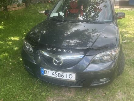 Серый Мазда 3, объемом двигателя 1.6 л и пробегом 225 тыс. км за 5900 $, фото 1 на Automoto.ua