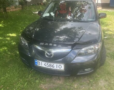 Серый Мазда 3, объемом двигателя 1.6 л и пробегом 225 тыс. км за 5900 $, фото 1 на Automoto.ua