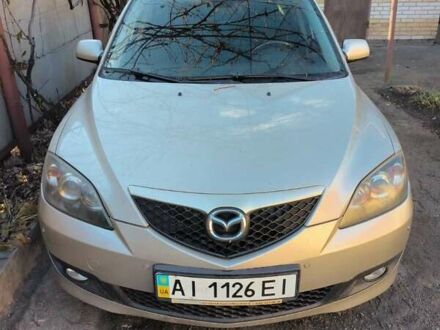 Серый Мазда 3, объемом двигателя 1.6 л и пробегом 185 тыс. км за 5999 $, фото 1 на Automoto.ua