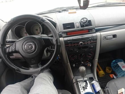 Сірий Мазда 3, об'ємом двигуна 1.6 л та пробігом 245 тис. км за 4401 $, фото 1 на Automoto.ua