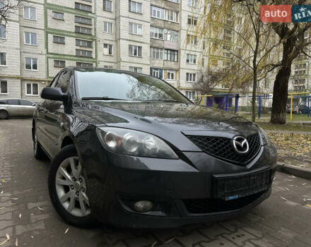 Серый Мазда 3, объемом двигателя 2 л и пробегом 189 тыс. км за 4750 $, фото 1 на Automoto.ua