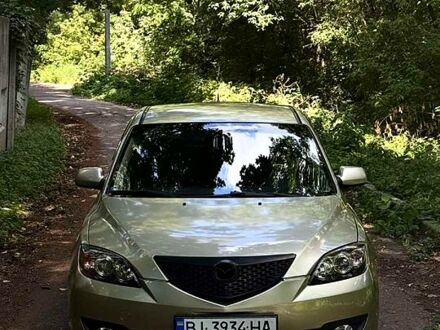 Серый Мазда 3, объемом двигателя 1.6 л и пробегом 169 тыс. км за 4700 $, фото 1 на Automoto.ua
