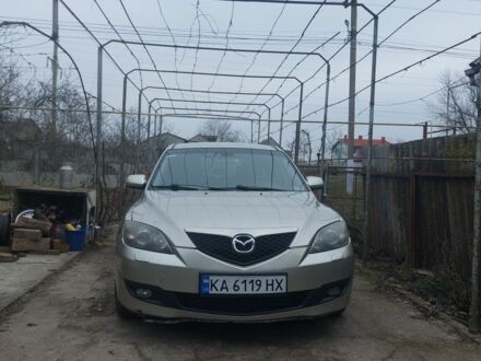 Серый Мазда 3, объемом двигателя 1.6 л и пробегом 247 тыс. км за 5500 $, фото 1 на Automoto.ua