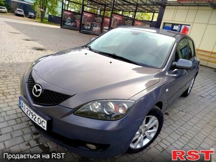Серый Мазда 3, объемом двигателя 1.6 л и пробегом 252 тыс. км за 4900 $, фото 1 на Automoto.ua