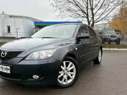 Серый Мазда 3, объемом двигателя 2 л и пробегом 188 тыс. км за 4999 $, фото 1 на Automoto.ua