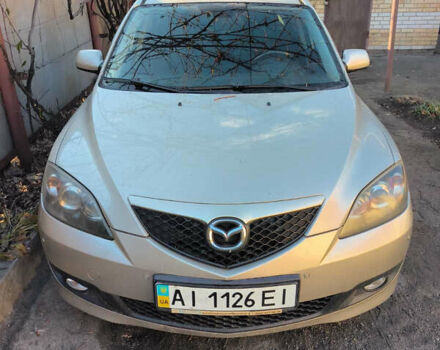 Серый Мазда 3, объемом двигателя 1.6 л и пробегом 185 тыс. км за 3000 $, фото 1 на Automoto.ua