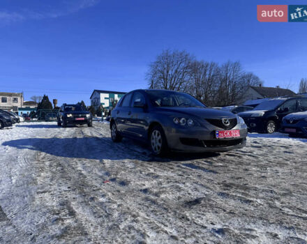 Серый Мазда 3, объемом двигателя 1.4 л и пробегом 240 тыс. км за 5590 $, фото 1 на Automoto.ua