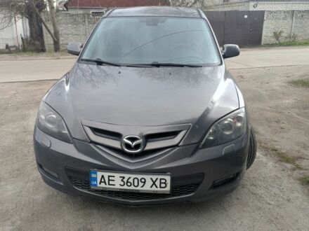 Серый Мазда 3, объемом двигателя 2 л и пробегом 258 тыс. км за 5000 $, фото 1 на Automoto.ua