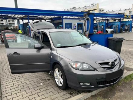 Серый Мазда 3, объемом двигателя 2.3 л и пробегом 140 тыс. км за 2800 $, фото 1 на Automoto.ua
