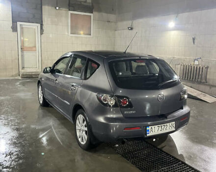 Серый Мазда 3, объемом двигателя 1.6 л и пробегом 249 тыс. км за 3900 $, фото 1 на Automoto.ua