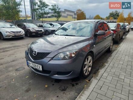 Серый Мазда 3, объемом двигателя 1.6 л и пробегом 261 тыс. км за 3999 $, фото 1 на Automoto.ua