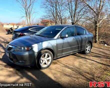 Серый Мазда 3, объемом двигателя 1.6 л и пробегом 222 тыс. км за 5500 $, фото 1 на Automoto.ua