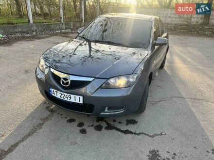 Серый Мазда 3, объемом двигателя 2 л и пробегом 290 тыс. км за 5700 $, фото 1 на Automoto.ua