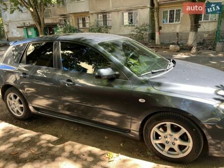 Сірий Мазда 3, об'ємом двигуна 2 л та пробігом 230 тис. км за 5500 $, фото 1 на Automoto.ua