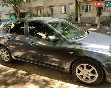 Серый Мазда 3, объемом двигателя 2 л и пробегом 230 тыс. км за 5500 $, фото 1 на Automoto.ua