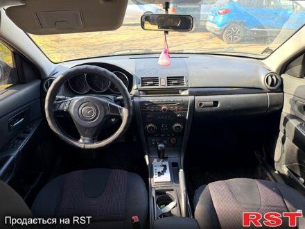 Серый Мазда 3, объемом двигателя 1.6 л и пробегом 200 тыс. км за 5999 $, фото 1 на Automoto.ua