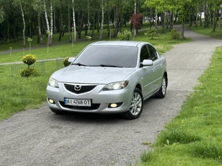Серый Мазда 3, объемом двигателя 1.6 л и пробегом 186 тыс. км за 5499 $, фото 1 на Automoto.ua