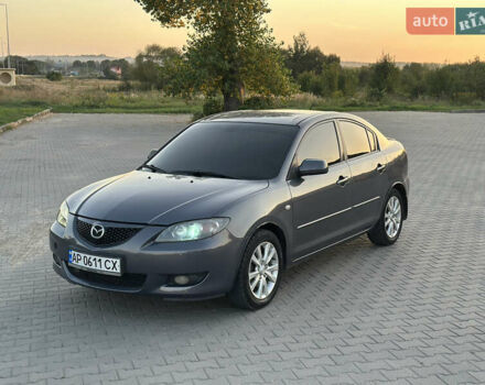Серый Мазда 3, объемом двигателя 1.6 л и пробегом 201 тыс. км за 3950 $, фото 1 на Automoto.ua