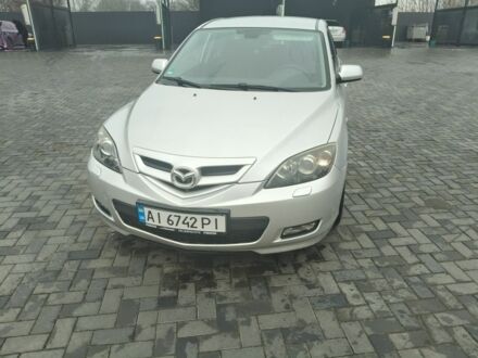 Серый Мазда 3, объемом двигателя 2 л и пробегом 250 тыс. км за 4600 $, фото 1 на Automoto.ua