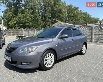 Серый Мазда 3, объемом двигателя 2 л и пробегом 205 тыс. км за 4600 $, фото 1 на Automoto.ua