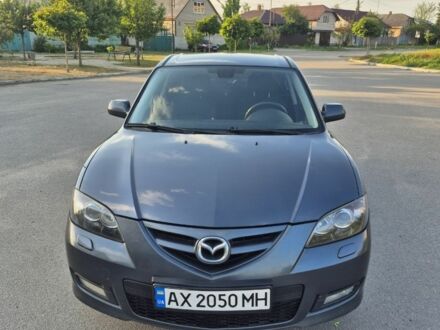 Серый Мазда 3, объемом двигателя 2 л и пробегом 195 тыс. км за 5600 $, фото 1 на Automoto.ua