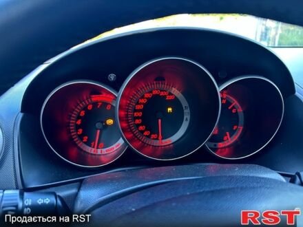 Серый Мазда 3, объемом двигателя 2 л и пробегом 168 тыс. км за 4800 $, фото 1 на Automoto.ua