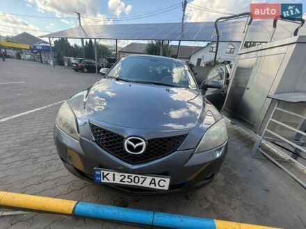 Серый Мазда 3, объемом двигателя 2 л и пробегом 170 тыс. км за 5700 $, фото 1 на Automoto.ua
