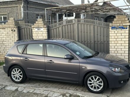 Серый Мазда 3, объемом двигателя 1.6 л и пробегом 59 тыс. км за 7000 $, фото 1 на Automoto.ua