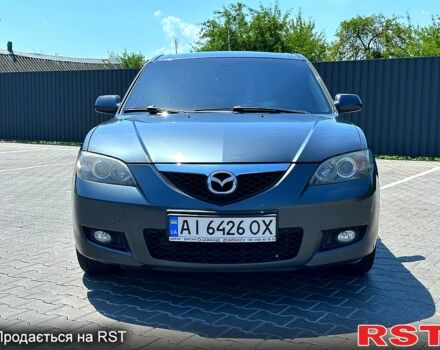 Серый Мазда 3, объемом двигателя 1.6 л и пробегом 302 тыс. км за 5600 $, фото 1 на Automoto.ua