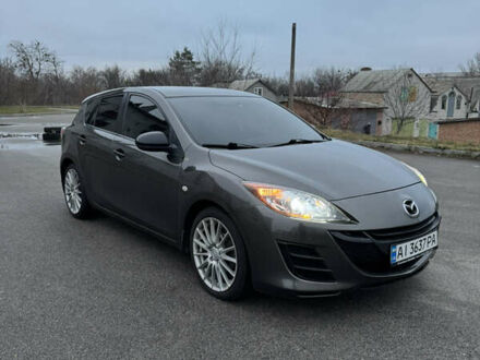 Сірий Мазда 3, об'ємом двигуна 1.6 л та пробігом 195 тис. км за 6900 $, фото 1 на Automoto.ua