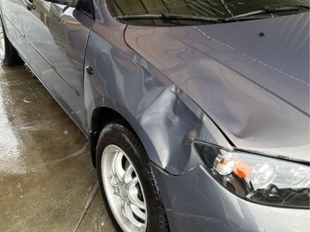 Серый Мазда 3, объемом двигателя 1.6 л и пробегом 300 тыс. км за 4000 $, фото 1 на Automoto.ua