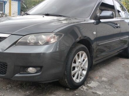 Серый Мазда 3, объемом двигателя 1 л и пробегом 307 тыс. км за 5421 $, фото 1 на Automoto.ua