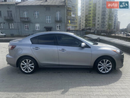 Серый Мазда 3, объемом двигателя 2 л и пробегом 206 тыс. км за 6000 $, фото 1 на Automoto.ua