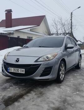 Серый Мазда 3, объемом двигателя 1.6 л и пробегом 245 тыс. км за 6300 $, фото 1 на Automoto.ua
