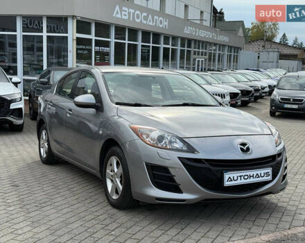 Серый Мазда 3, объемом двигателя 1.6 л и пробегом 128 тыс. км за 7999 $, фото 1 на Automoto.ua