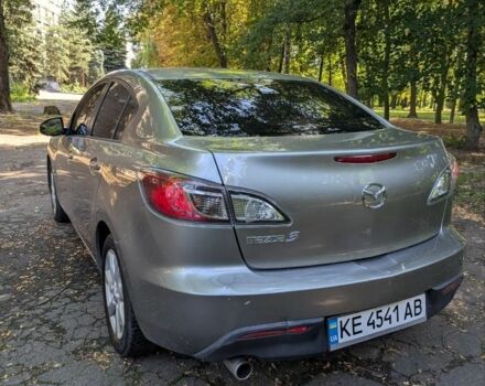 Сірий Мазда 3, об'ємом двигуна 2 л та пробігом 211 тис. км за 6980 $, фото 1 на Automoto.ua