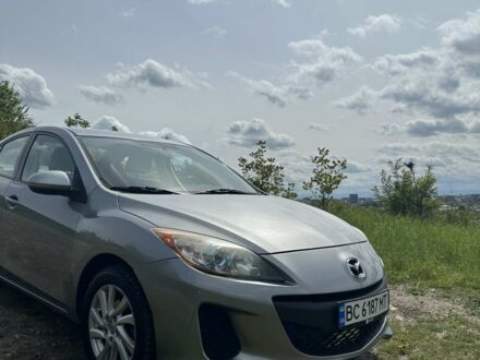 Серый Мазда 3, объемом двигателя 2 л и пробегом 320 тыс. км за 6500 $, фото 1 на Automoto.ua