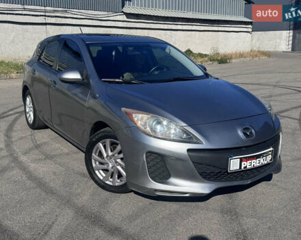 Серый Мазда 3, объемом двигателя 2 л и пробегом 190 тыс. км за 7999 $, фото 1 на Automoto.ua