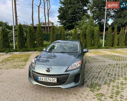 Серый Мазда 3, объемом двигателя 2 л и пробегом 211 тыс. км за 6300 $, фото 1 на Automoto.ua