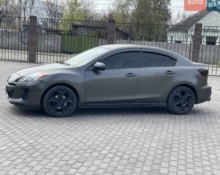 Серый Мазда 3, объемом двигателя 2 л и пробегом 210 тыс. км за 7300 $, фото 1 на Automoto.ua
