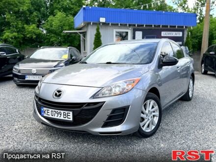 Серый Мазда 3, объемом двигателя 2 л и пробегом 132 тыс. км за 7800 $, фото 1 на Automoto.ua
