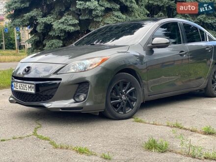 Серый Мазда 3, объемом двигателя 2 л и пробегом 290 тыс. км за 7777 $, фото 1 на Automoto.ua