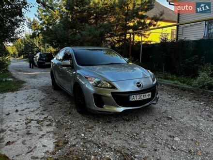 Серый Мазда 3, объемом двигателя 2 л и пробегом 185 тыс. км за 7600 $, фото 1 на Automoto.ua