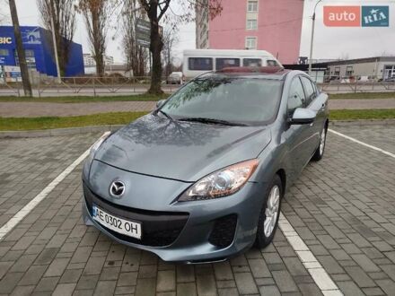 Сірий Мазда 3, об'ємом двигуна 2 л та пробігом 232 тис. км за 7799 $, фото 1 на Automoto.ua