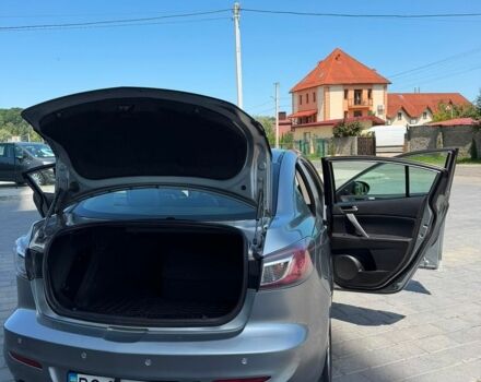 Сірий Мазда 3, об'ємом двигуна 2 л та пробігом 220 тис. км за 7399 $, фото 1 на Automoto.ua