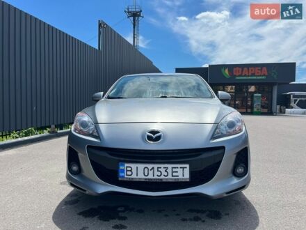 Серый Мазда 3, объемом двигателя 1.56 л и пробегом 253 тыс. км за 7800 $, фото 1 на Automoto.ua