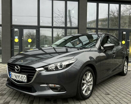 Серый Мазда 3, объемом двигателя 2 л и пробегом 146 тыс. км за 10700 $, фото 1 на Automoto.ua